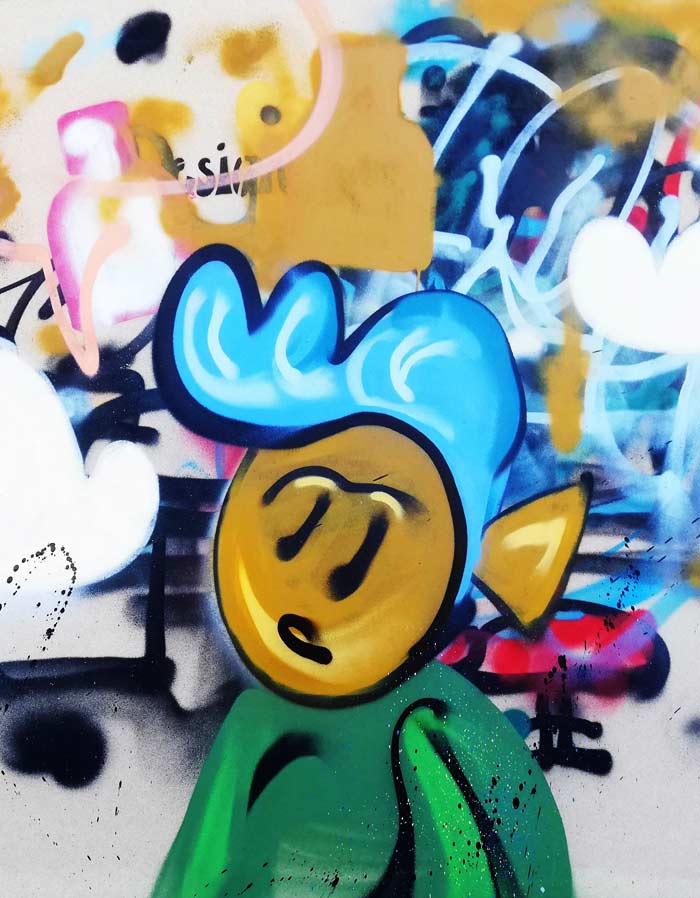 Maleri malet med graffiti med figur malet på kursus